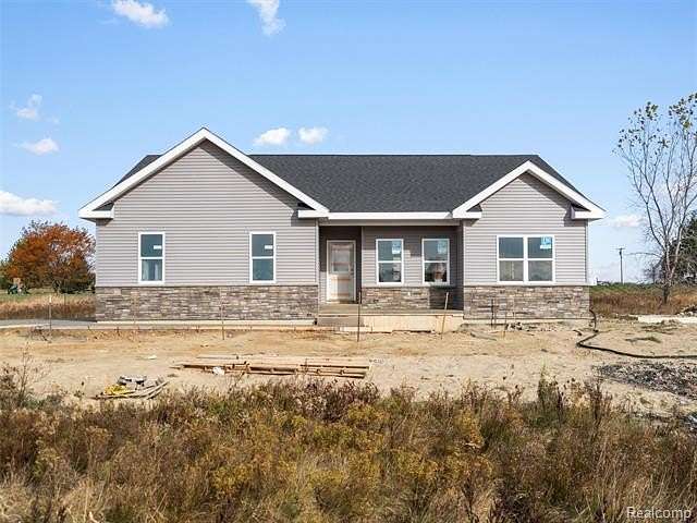 2.9 Acres of Residential Land with Home for Sale in Almont, Michigan