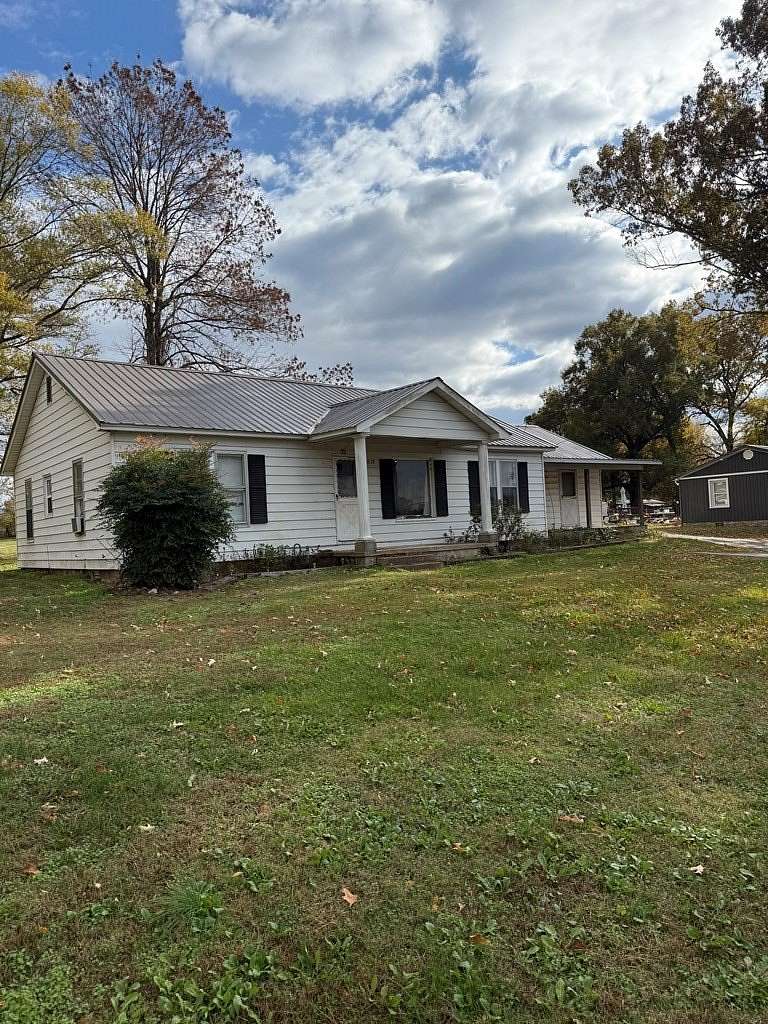 1.5 Acres of Residential Land with Home for Sale in McKenzie, Tennessee