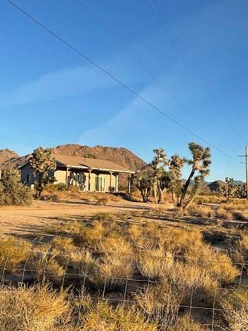2.35 Acres of Residential Land with Home for Sale in Yucca, Arizona