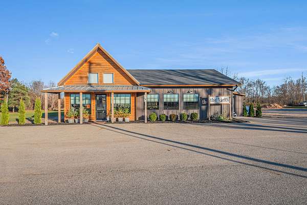 15.3 Acres of Improved Commercial Land for Sale in Gowen, Michigan