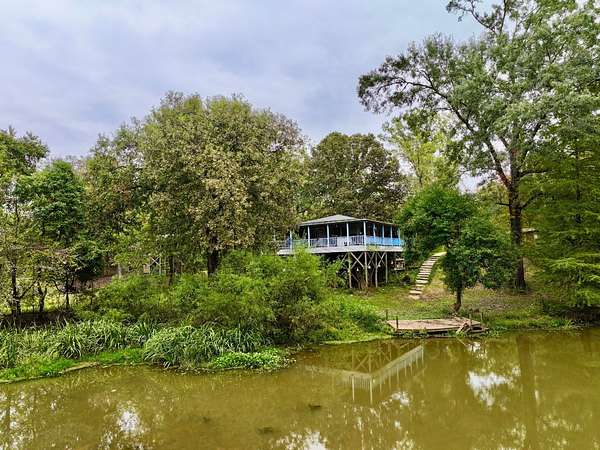 1.72 Acres of Land with Home for Sale in Coffeeville, Alabama