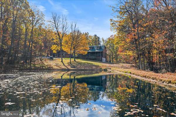 11.6 Acres of Land with Home for Sale in Berkeley Springs, West Virginia