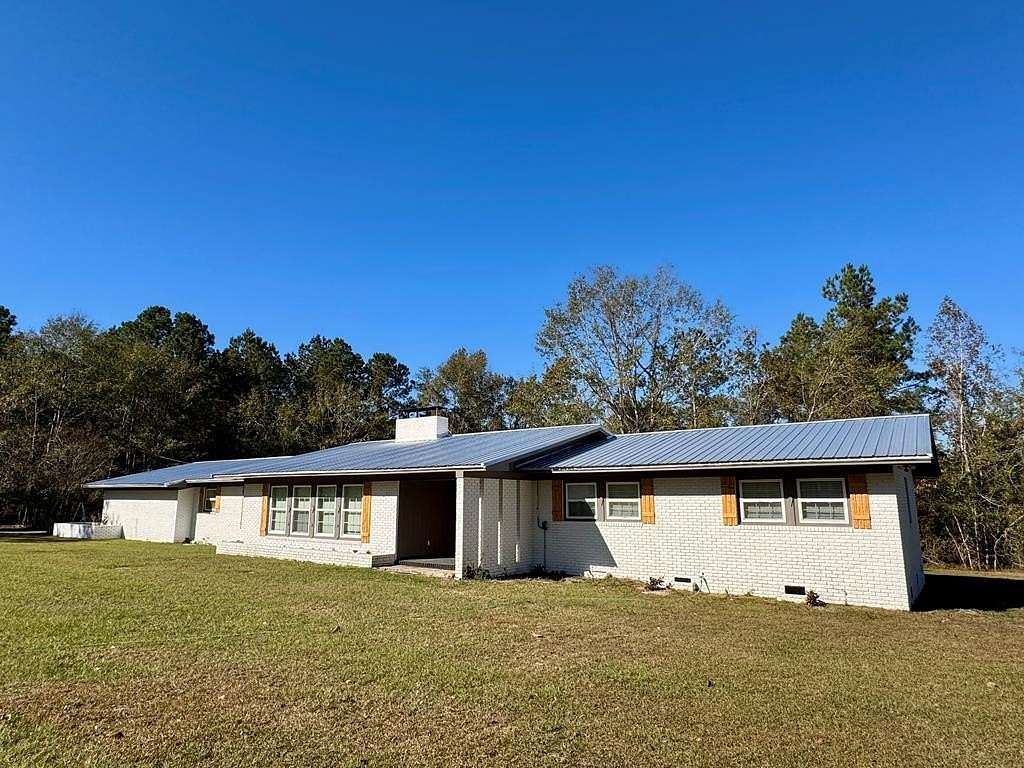 5 Acres of Residential Land with Home for Sale in Ailey, Georgia