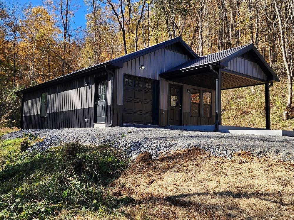 23.9 Acres of Recreational Land with Home for Sale in Whitleyville, Tennessee