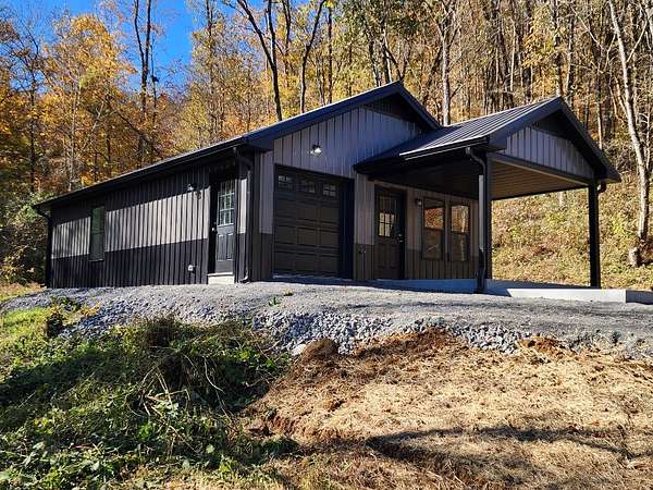 23.9 Acres of Recreational Land with Home for Sale in Whitleyville, Tennessee