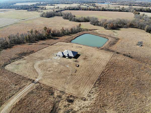 73.1 Acres of Land with Home for Sale in Chanute, Kansas