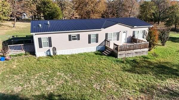 5 Acres of Residential Land with Home for Sale in Checotah, Oklahoma