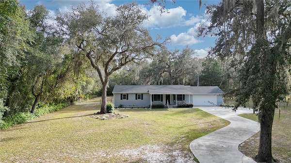 2 Acres of Residential Land with Home for Sale in Silver Springs, Florida