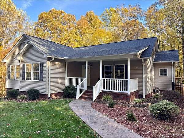 4 Acres of Residential Land with Home for Sale in Roaring River, North Carolina