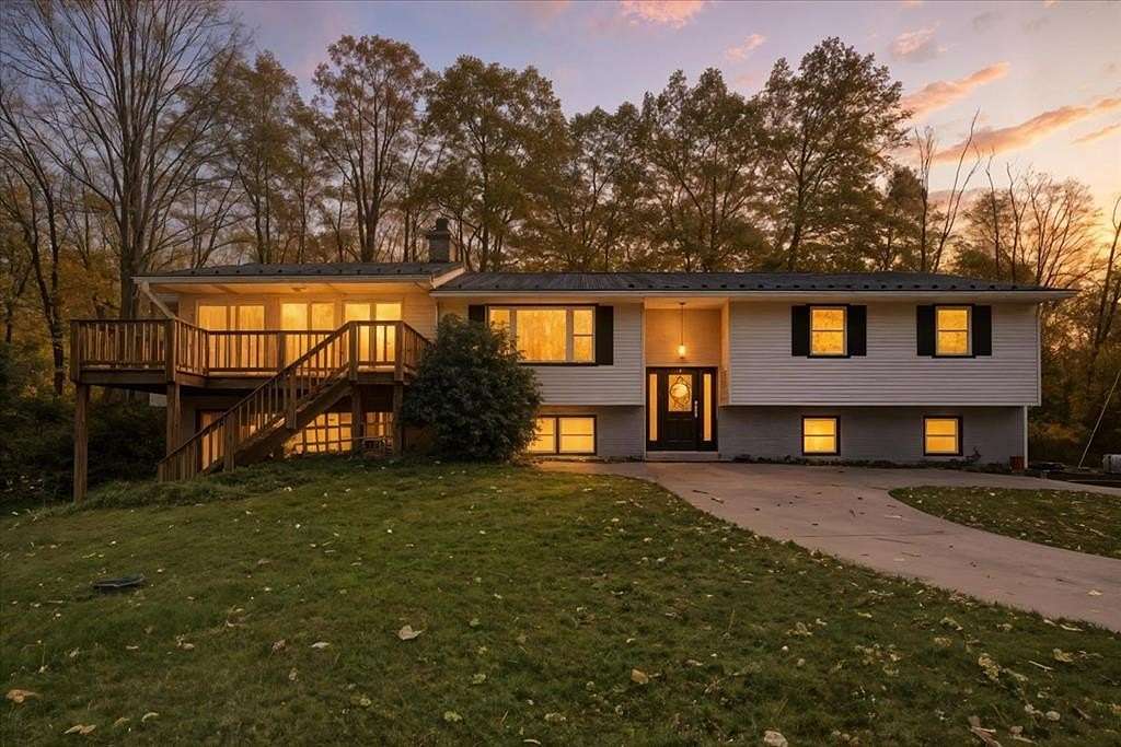 9.9 Acres of Residential Land with Home for Sale in Perrysville, Ohio