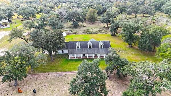 102 Acres of Recreational Land with Home for Sale in Louise, Texas