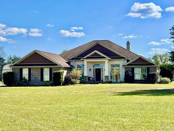 4.13 Acres of Land with Home for Sale in Pace, Florida