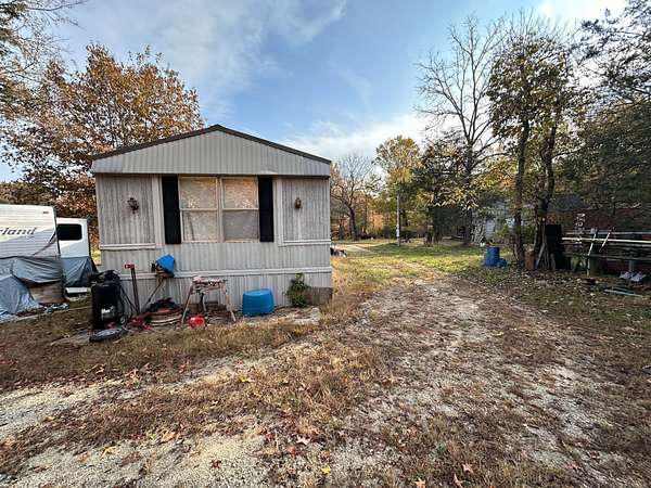 10 Acres of Recreational Land with Home for Sale in Sidney, Arkansas