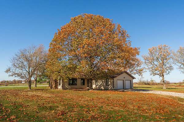 11.2 Acres of Land with Home for Sale in Seymour, Missouri