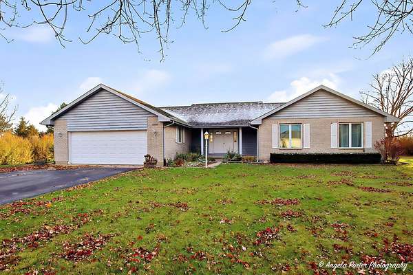 1.7 Acres of Residential Land with Home for Sale in Harvard, Illinois