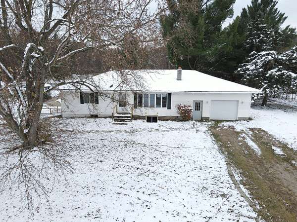 5 Acres of Residential Land with Home for Sale in Shelbyville, Michigan