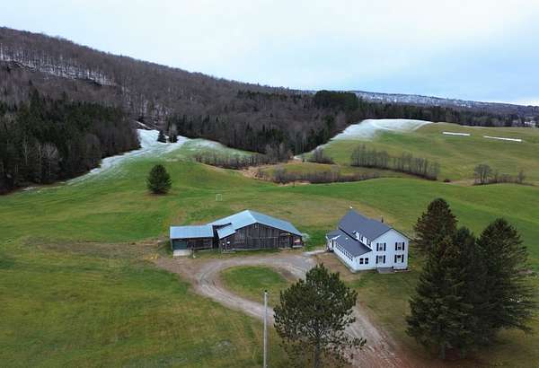 60.9 Acres of Land with Home for Sale in Brighton Town, Vermont