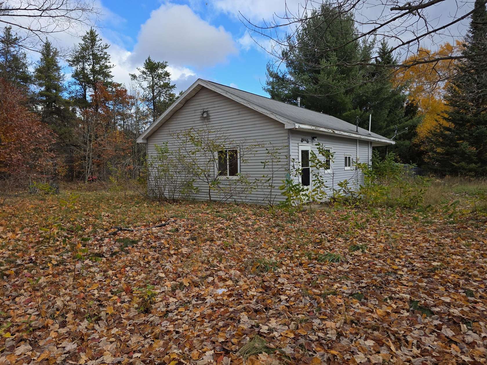 5 Acres of Residential Land with Home for Sale in Brimley, Michigan