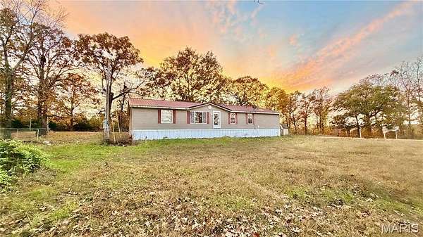 4.45 Acres of Land with Home for Sale in Laquey, Missouri