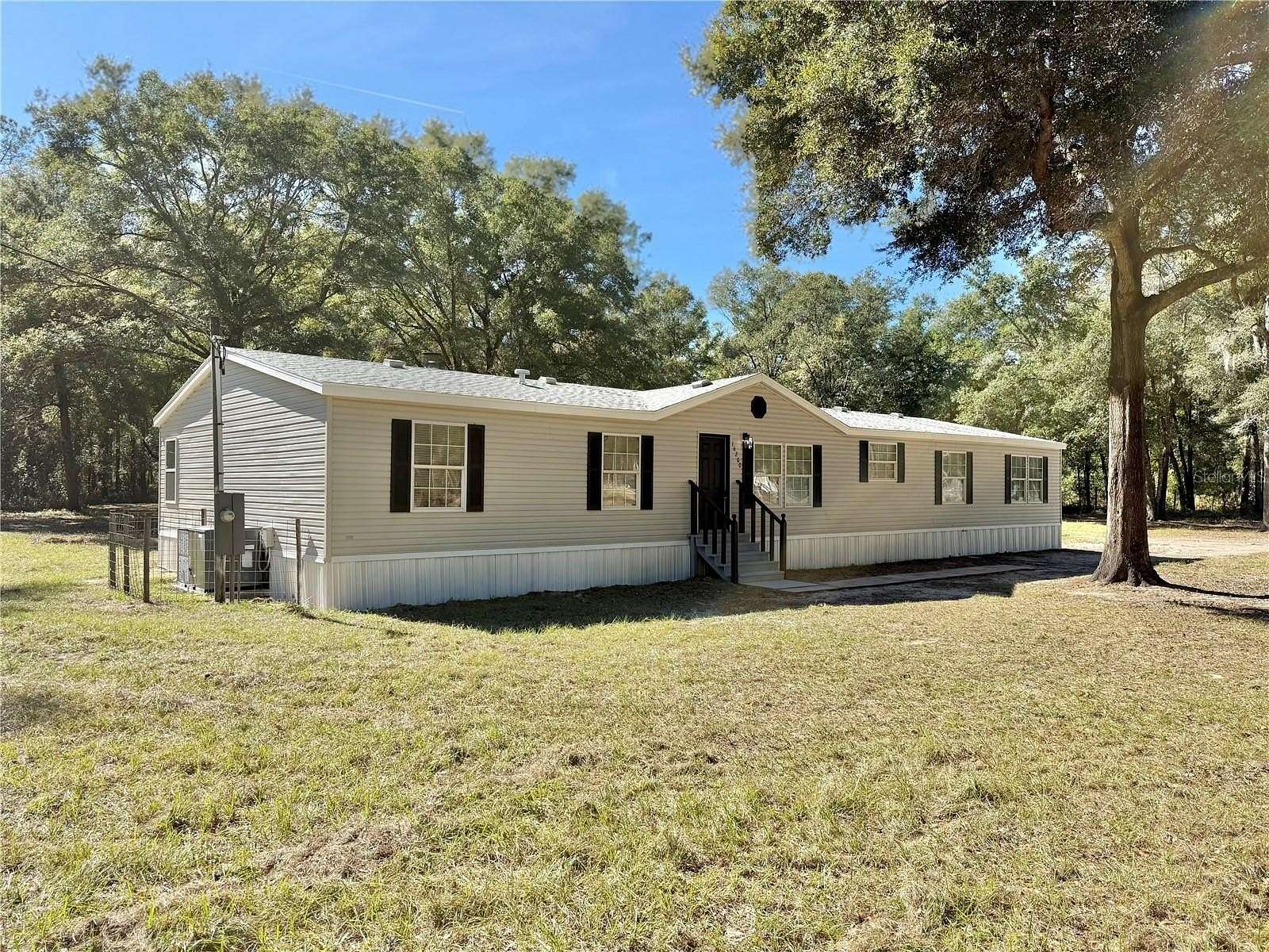 2.4 Acres of Residential Land with Home for Sale in Ocala, Florida