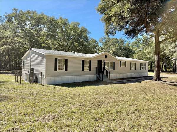 2.4 Acres of Residential Land with Home for Sale in Ocala, Florida