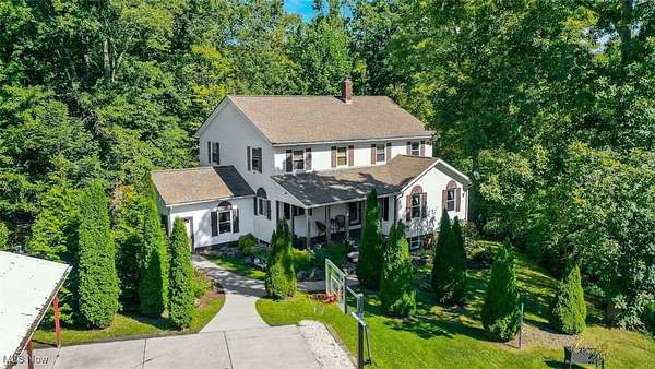 2.66 Acres of Residential Land with Home for Auction in West Farmington, Ohio