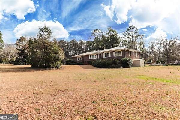 12.7 Acres of Land with Home for Sale in Fayetteville, Georgia