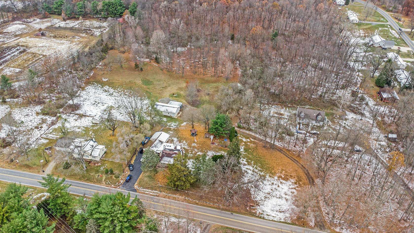 6.1 Acres of Land with Home for Sale in Clarklake, Michigan