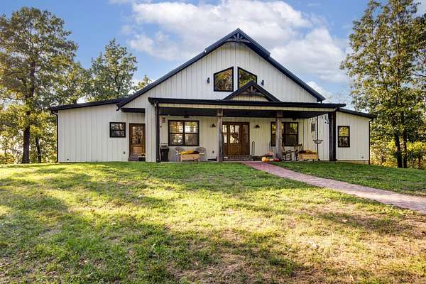 10 Acres of Residential Land with Home for Sale in Pleasant Hope, Missouri