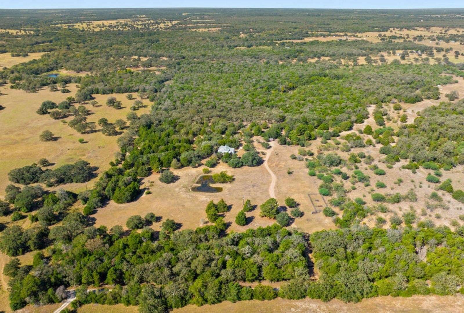 21 Acres of Land with Home for Sale in Smithville, Texas