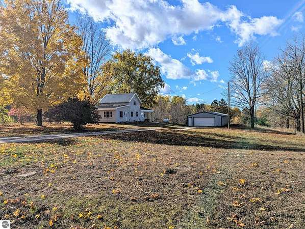 10 Acres of Land with Home for Sale in Manton, Michigan