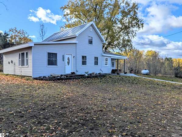10 Acres of Land with Home for Sale in Manton, Michigan
