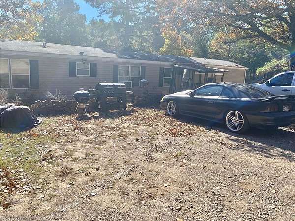 10.3 Acres of Land with Home for Sale in Paris, Arkansas