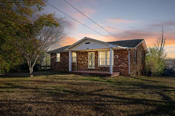 44.1 Acres of Land with Home for Sale in Lyles, Tennessee