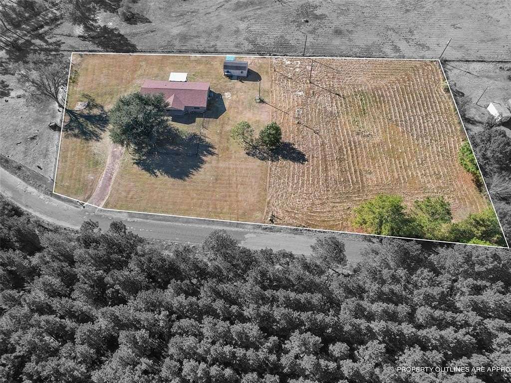2 Acres of Residential Land with Home for Sale in Gilmer, Texas