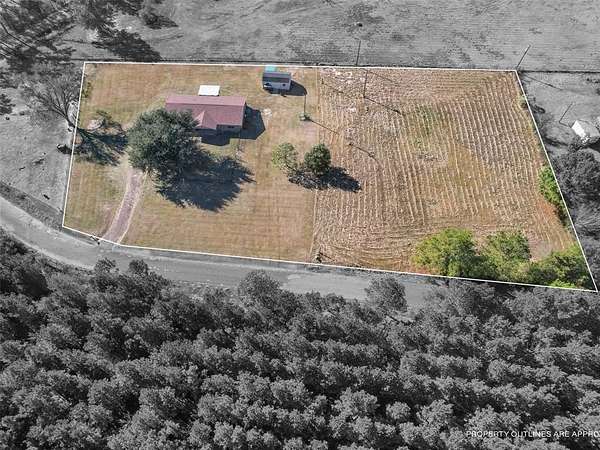 2 Acres of Residential Land with Home for Sale in Gilmer, Texas