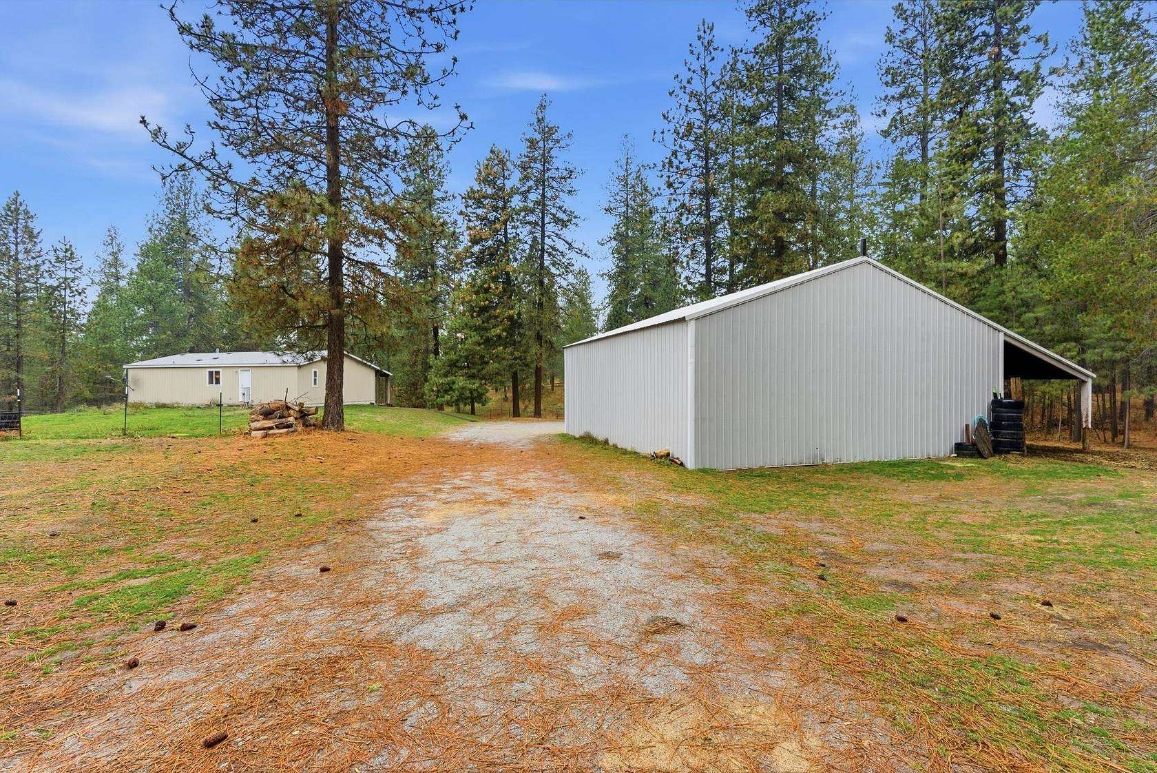 10 Acres of Residential Land with Home for Sale in Elk, Washington