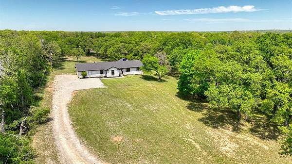 10 Acres of Residential Land with Home for Sale in Weatherford, Texas