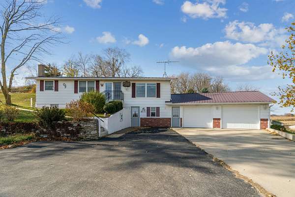 5 Acres of Land with Home for Sale in Lansing, Iowa