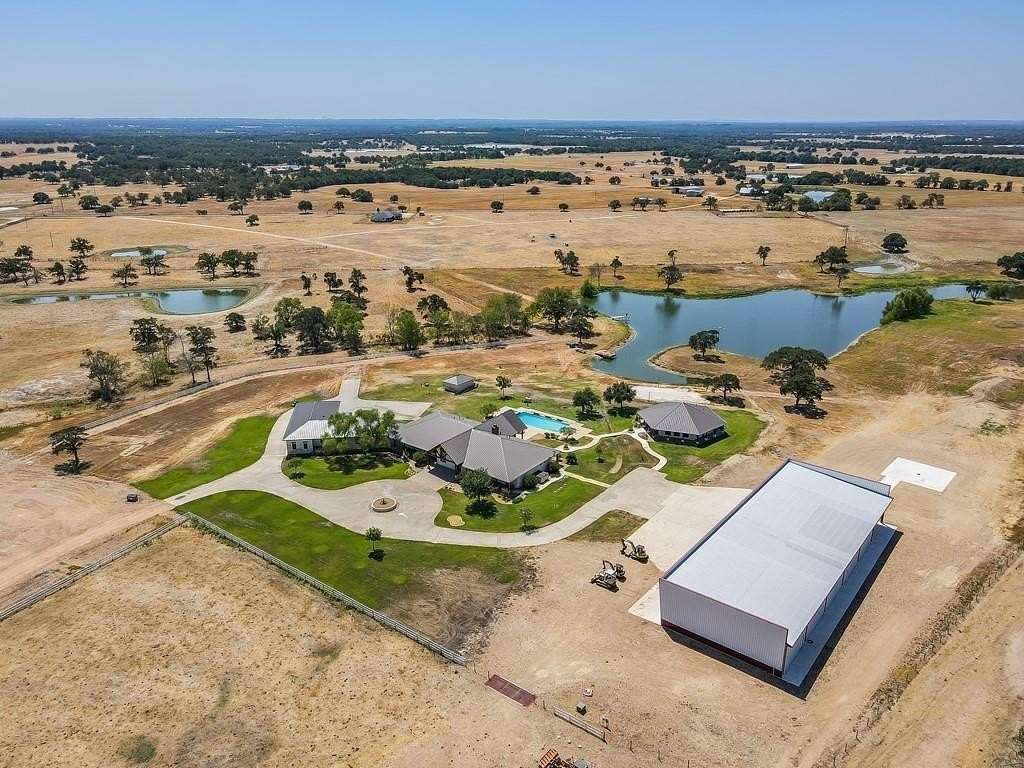 109 Acres of Agricultural Land with Home for Sale in Giddings, Texas