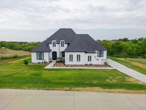 2 Acres of Residential Land with Home for Sale in Lakewood Village, Texas