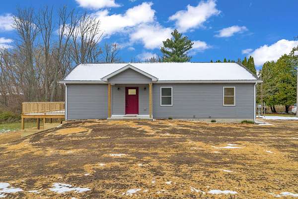 11.6 Acres of Land with Home for Sale in Carsonville, Michigan