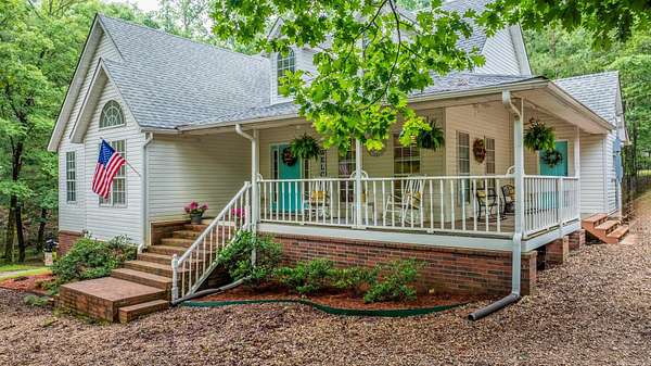 5 Acres of Residential Land with Home for Sale in Paron, Arkansas