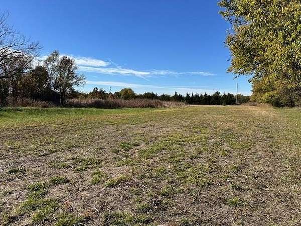 5.8 Acres of Land with Home for Auction in Winfield, Kansas