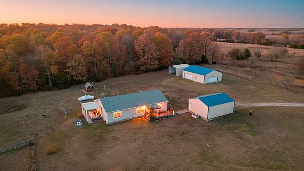 10 Acres of Residential Land with Home for Sale in Miller, Missouri