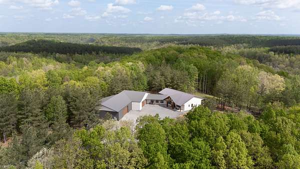 92.8 Acres of Recreational Land with Home for Sale in Summertown, Tennessee