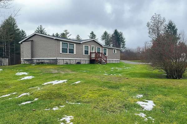 1.5 Acres of Residential Land with Home for Sale in Irasburg, Vermont