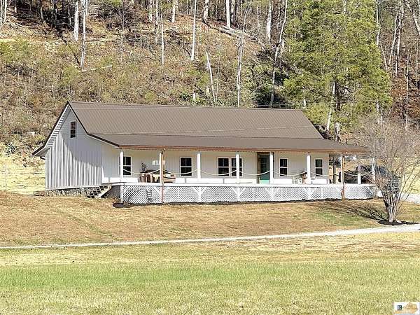 86.4 Acres of Land with Home for Sale in Columbia, Kentucky