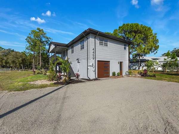 2.27 Acres of Residential Land with Home for Sale in Naples, Florida