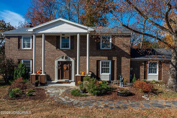 6.53 Acres of Residential Land with Home for Sale in Holts Summit, Missouri